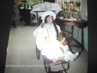 Doll Carriage and child's parasol